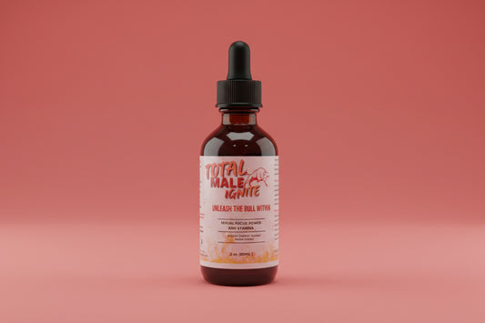 Bottle of 'Total Male Ignite' on a wooden surface with a gray background